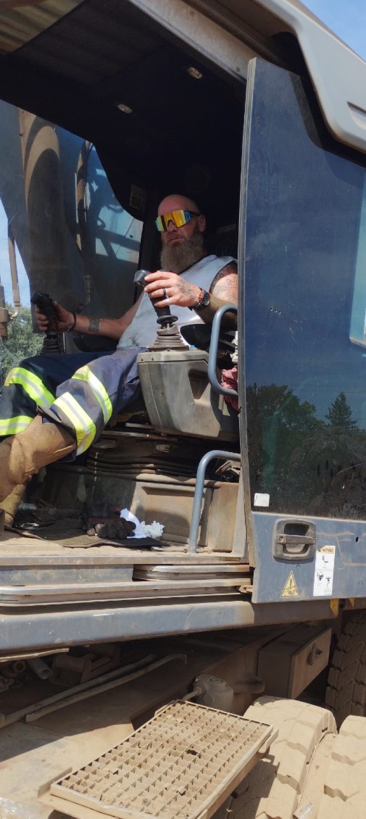 Jimmy Dowdy at the controls of the Fuchs 331 material handler