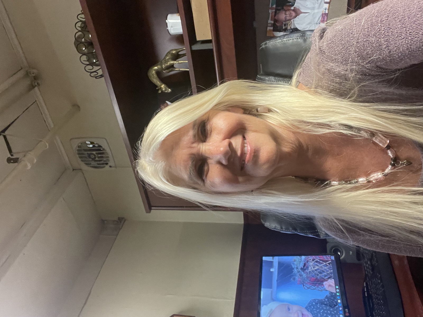 Lisa Carpenter, Corporate Secretary, at her desk in the Alliance office